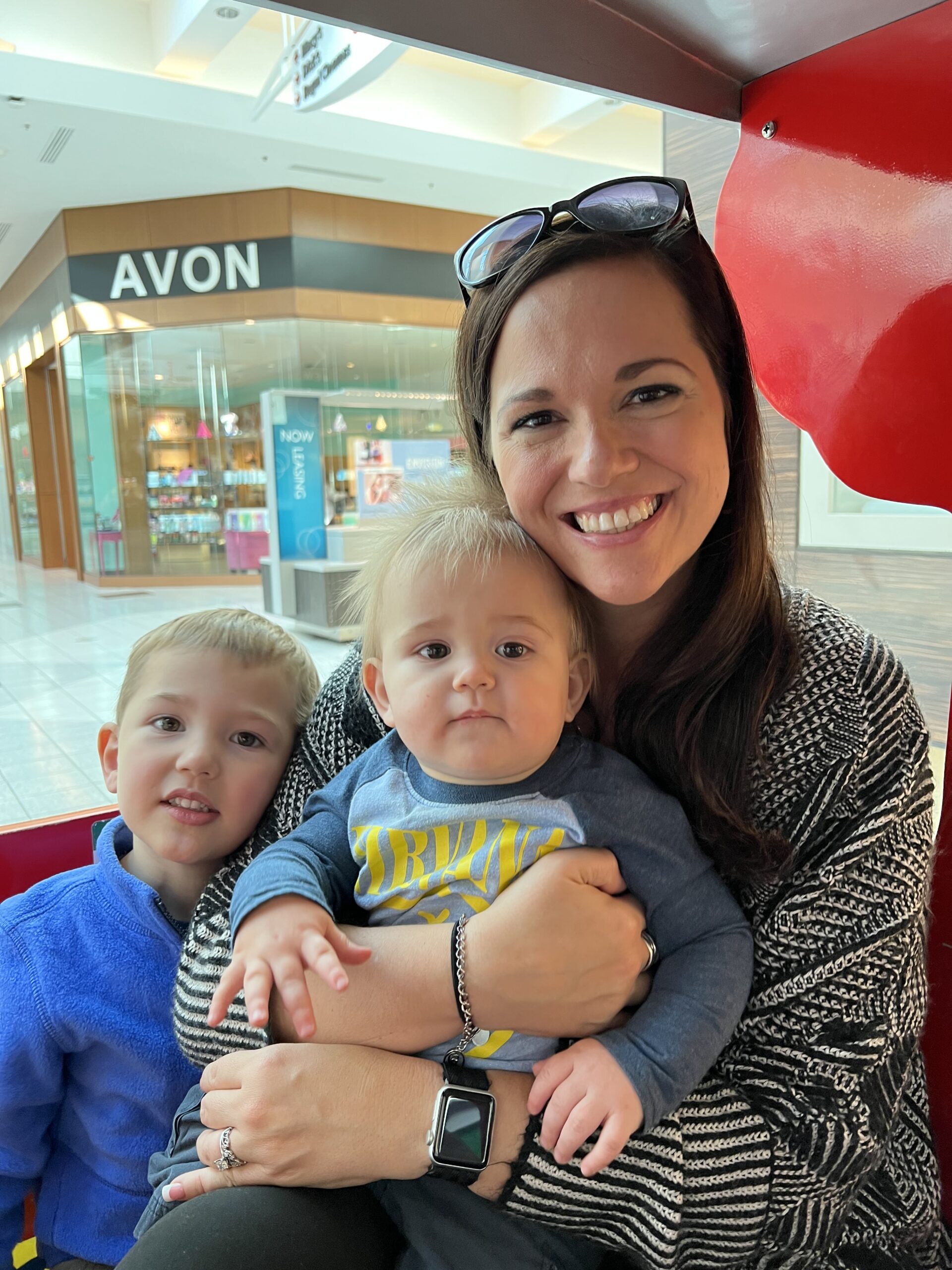 All Smiles Aboard trackless train at the mall